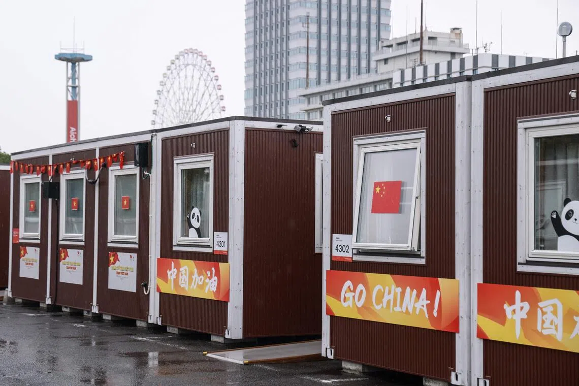 Temporary container huts being used to house Chinese athletes during the 2026 Asian Games at the Garden Pier in Nagoya on Sept 27.