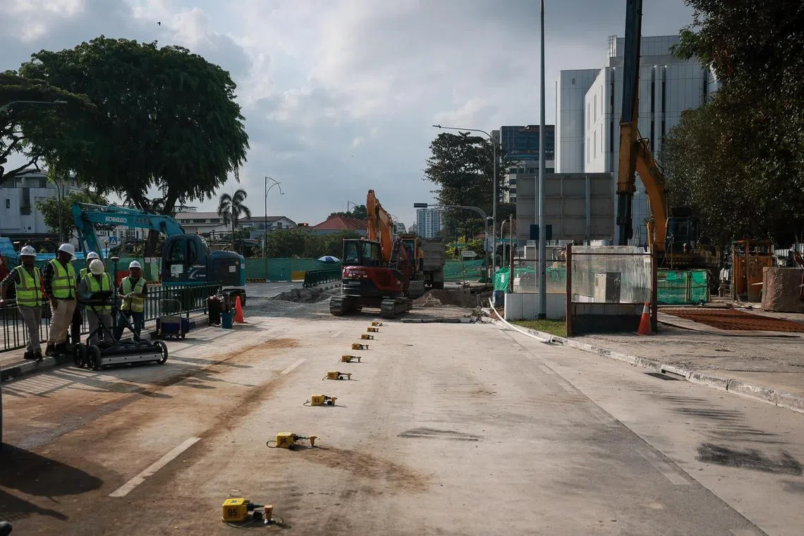 The sinkhole being repaired on July 29. The stretch of Tanjong Katong Road South that has been closed for repairs will be progressively reopened to traffic on Aug 2.