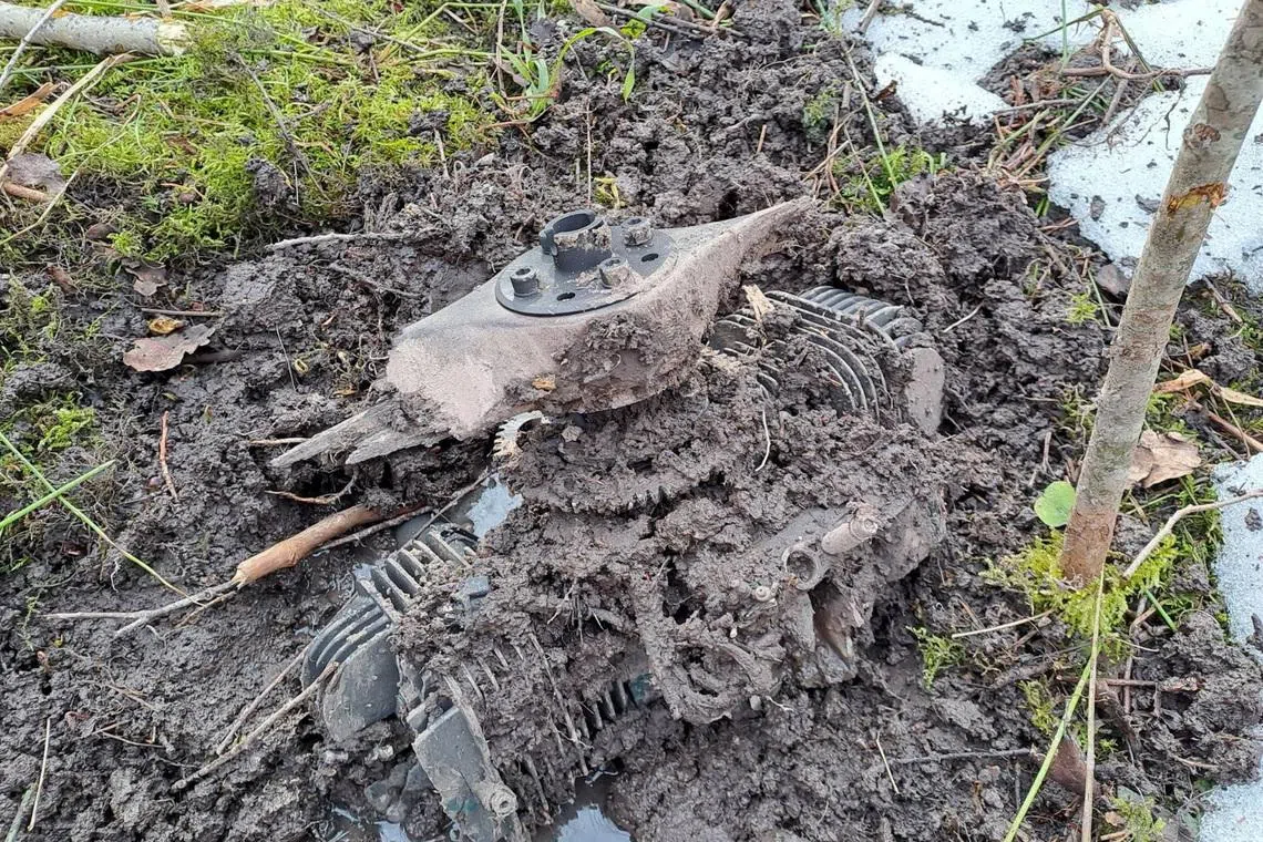 A part of a Ukrainian unmanned aerial vehicle, which according to the Latvian National Armed Forces, flew into Latvian airspace and crashed in Kraslavas region, Latvia, in this handout image obtained by Reuters on March 25, 2026.   Latvian Defence Forces/Handout via REUTERS