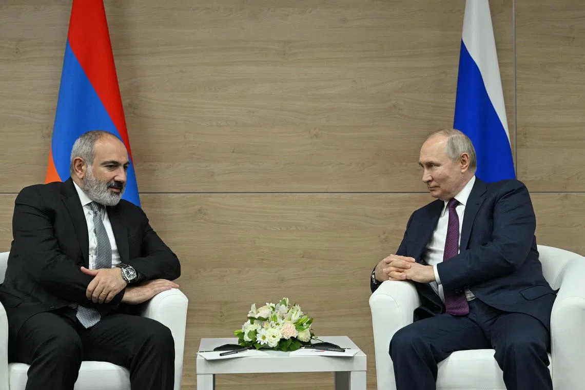 FILE PHOTO: Russian President Vladimir Putin meets with Armenian Prime Minister Nikol Pashinyan in Sochi, Russia June 9, 2023. Host photo agency/Ramil Sitdikov via REUTERS/File Photo