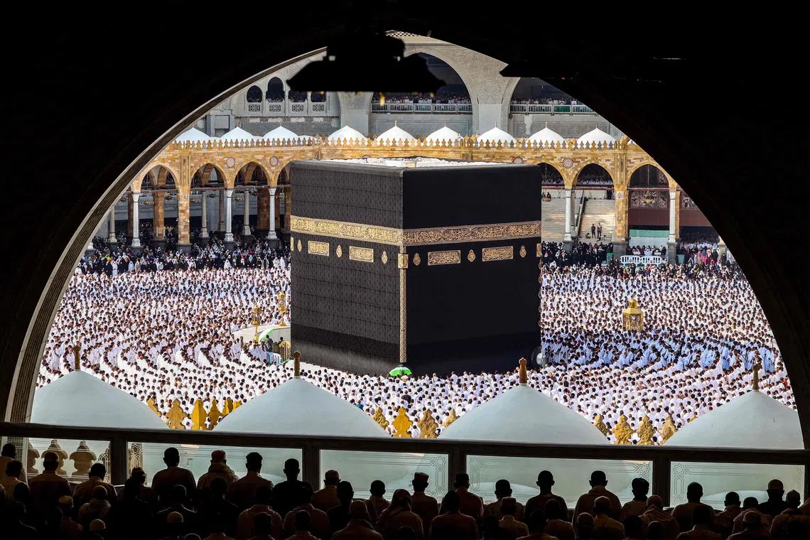 Muslim worshippers gather to pray around the Kaaba, Islam's holiest shrine, at the Grand Mosque in the holy city of Mecca on the last Friday of the holy month of Ramadan on April 5.