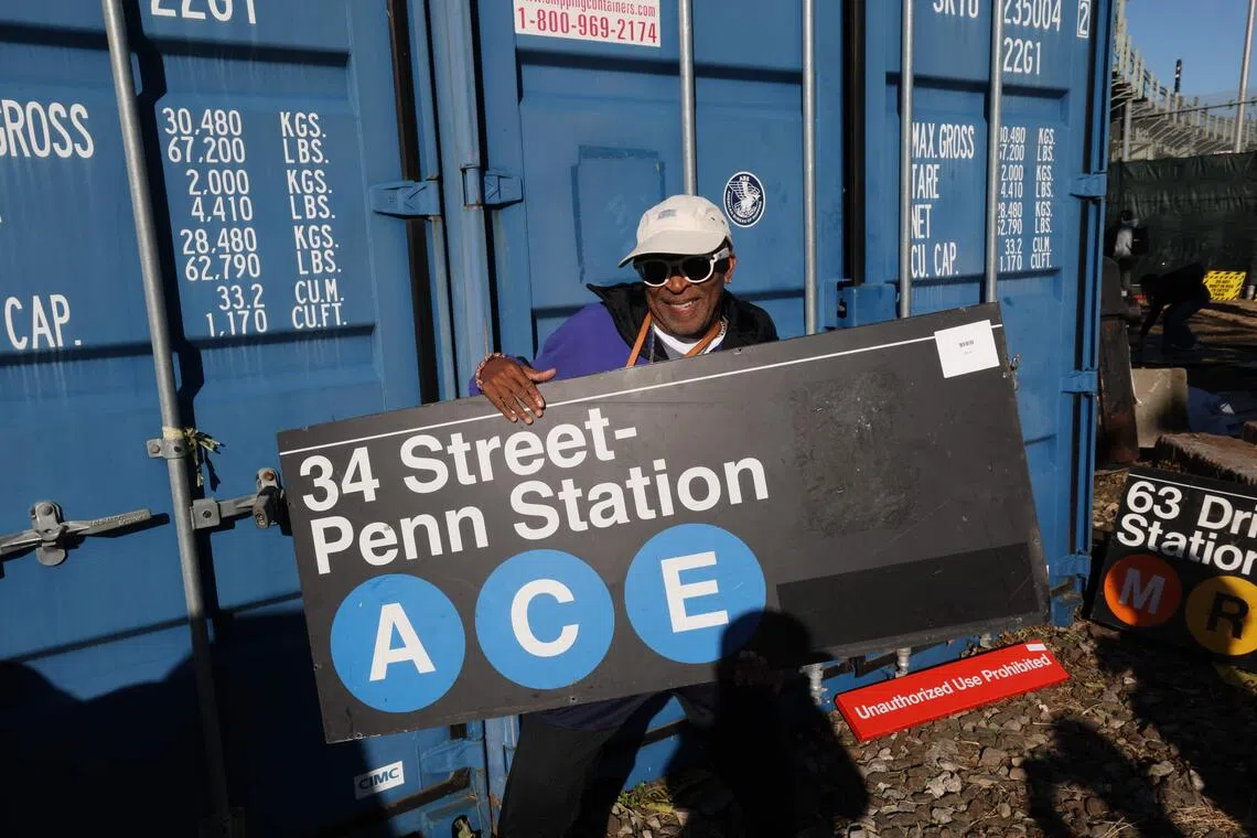 Film director Spike Lee bought a sign marked “Penn Station”, the subway stop for Madison Square Garden, where the Knicks basketball team plays.
