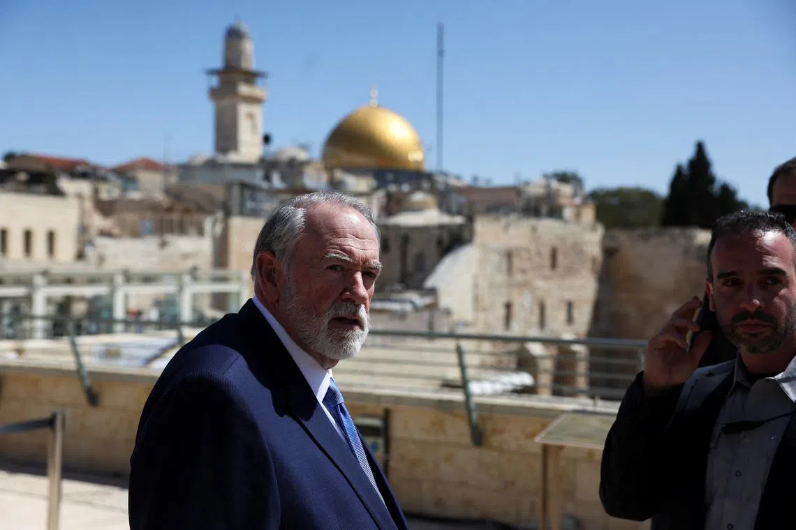 U.S. Ambassador to Israel Mike Huckabee looks on during the day he visits the Western Wall, Judaism's holiest prayer site, in Jerusalem's Old City, April 18, 2025. REUTERS/Ronen Zvulun/File Photo