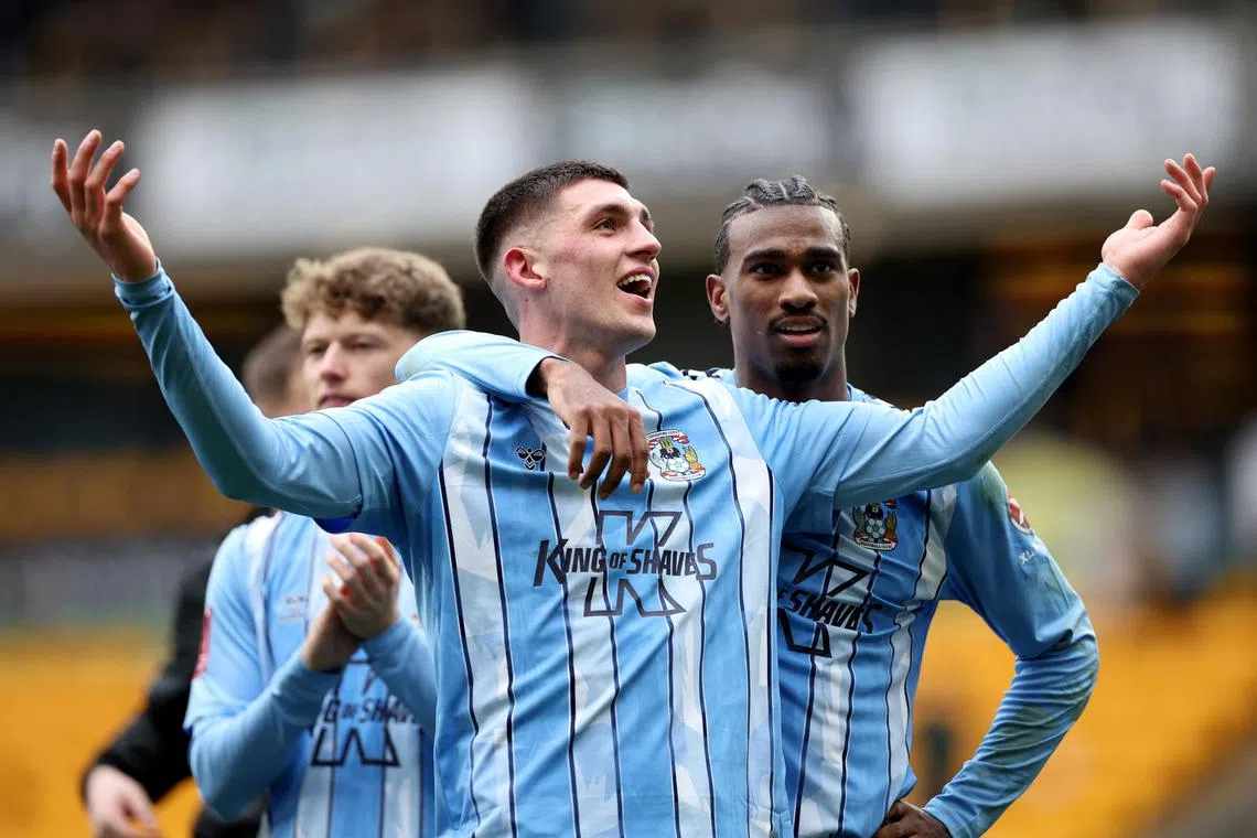 Coventry City's Bobby Thomas and Haji Wright, who scored the winning goal, celebrate after the match.