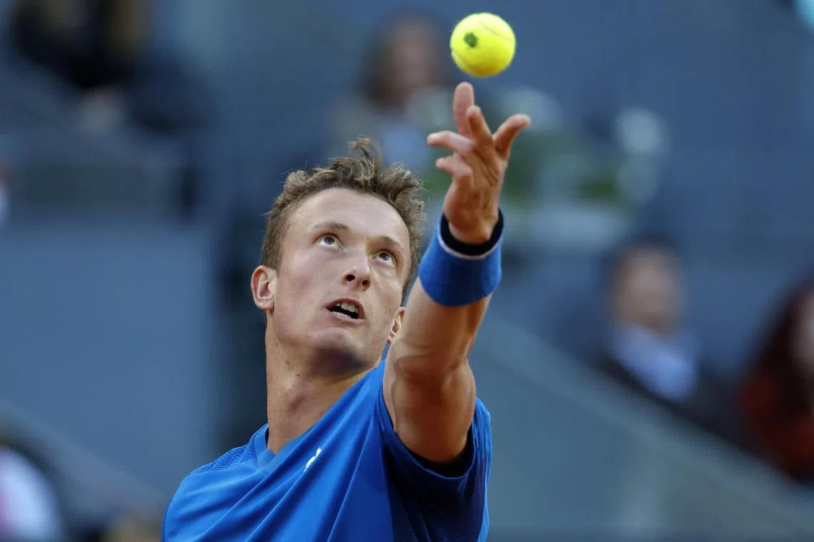 Jiri Lehecka of the Czech Republic in action against Daniil Medvedev.