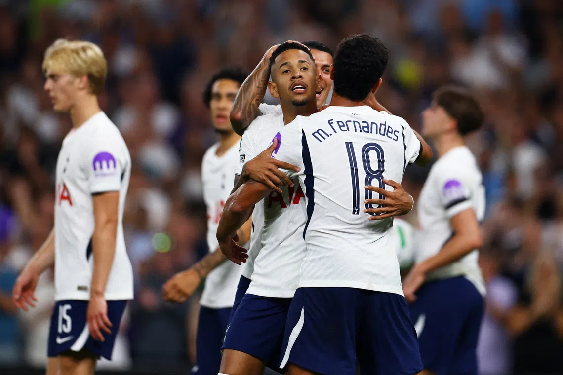 Soccer Football - Carabao Cup - Second Round - Tottenham Hotspur v Charlton Athletic - Tottenham Hotspur Stadium, London, Britain - August 26, 2026 Tottenham Hotspur's Savio celebrates scoring their fourth goal with Mateus Fernandes Action Images via Reuters/Peter Cziborra