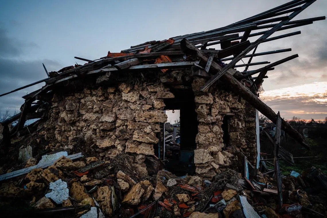 A destroyed house is seen in Posad-Pokrovs'ke village, Kherson region, amid the Russian invasion of Ukraine, on Dec 26, 2022.