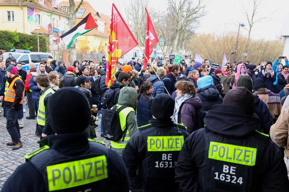 Police officers stand guard as students and activists hold a protest in support of Palestinians in Gaza, amid the ongoing conflict between Israel and the Palestinian Islamist group Hamas, at the Free University of Berlin, Germany, February 8, 2024. REUTERS/Fabrizio Bensch