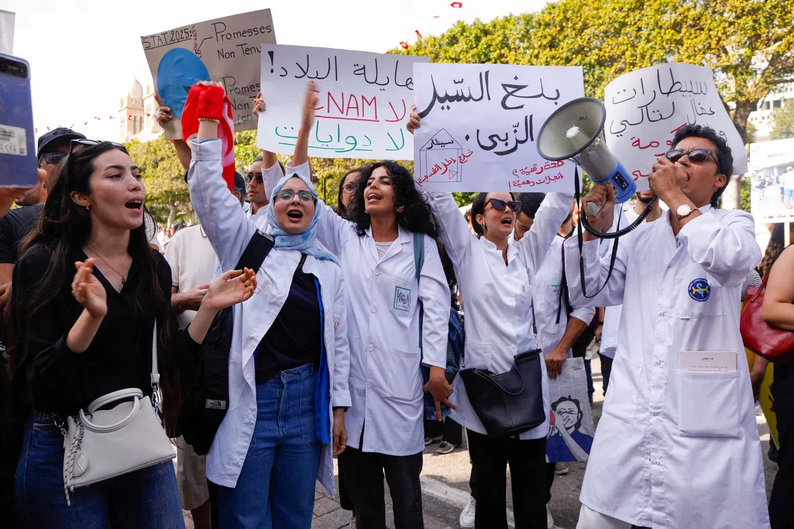 Demonstrators attend a protest led by the Tunisian General Labour Union (UGTT), demanding the restoration of democracy and denouncing mounting restrictions on freedoms, intensifying pressure on President Kais Saied amid a deepening economic and political crisis, in Tunis, Tunisia, October 17, 2026. REUTERS/Zoubeir Souissi