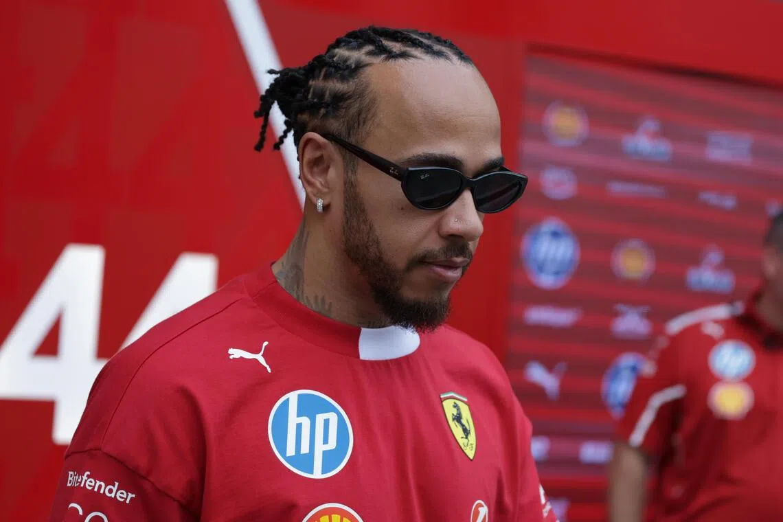 epa12571463 Scuderia Ferrari driver Lewis Hamilton of Britain arrives ahead of a practice session for the Formula One Abu Dhabi Grand Prix, in Abu Dhabi, United Arab Emirates, 05 December 2025. The 2025 Formula One Abu Dhabi Grand Prix will be held at the Yas Marina Circuit racetrack on 07 December.  EPA/ALI HAIDER