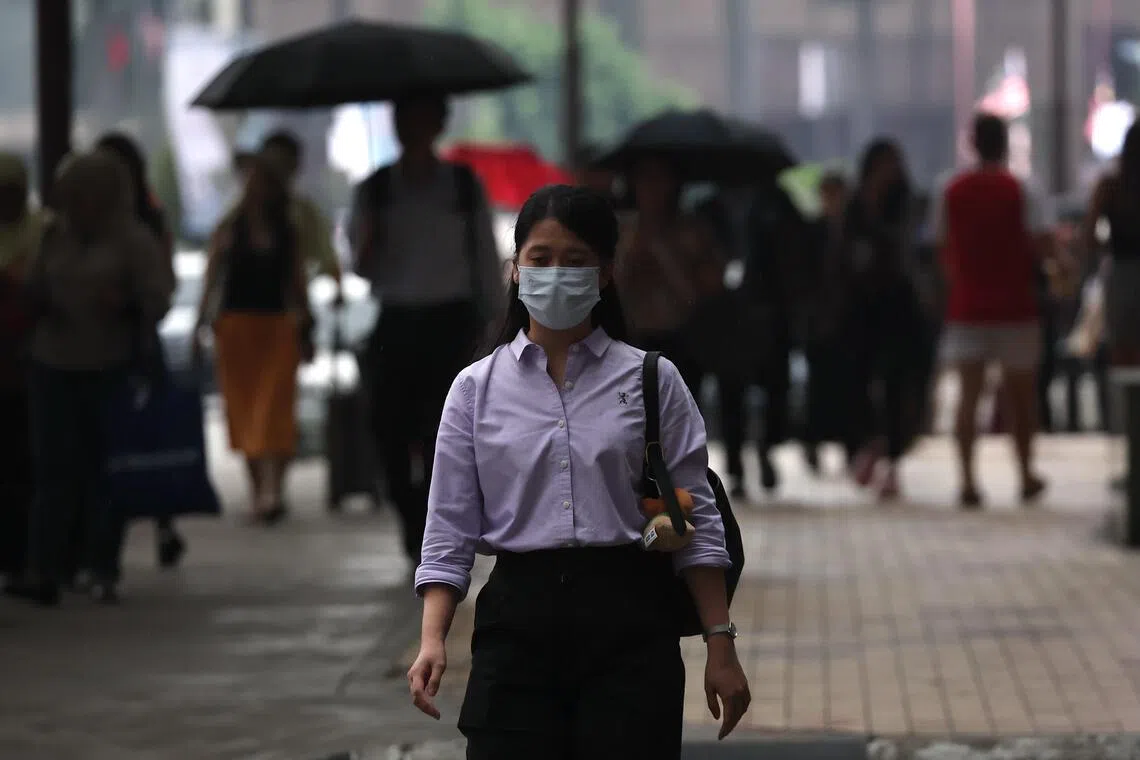 Some Malaysians are stocking up on face masks and limiting outdoor activities amid concerns that conditions could worsen in the coming weeks.