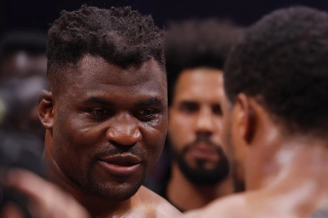 Boxing - Anthony Joshua v Francis Ngannou - Kingdom Arena, Riyadh, Saudi Arabia - March 9, 2024 Francis Ngannou with Anthony Joshua after losing the fight REUTERS/Andrew Couldridge