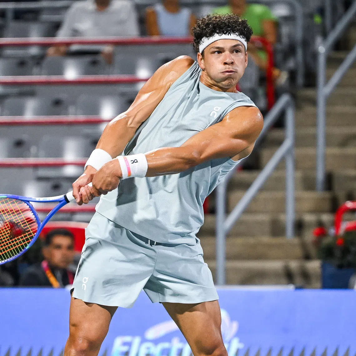 Aug 12, 2026; Montreal, QC, Canada; Ben Shelton (USA) returns the ball to Learner Tien (USA) in semifinal play at IGA Stadium. Mandatory Credit: David Kirouac-Imagn Images