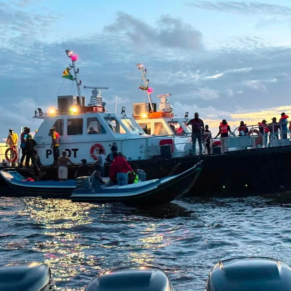 Rescue efforts progress after MV Barima, a ferry carrying people, capsized off the coast of Guyana in South America, in this handout image released on July 19, 2026. Bishop Juan Edghill/Handout via REUTERS