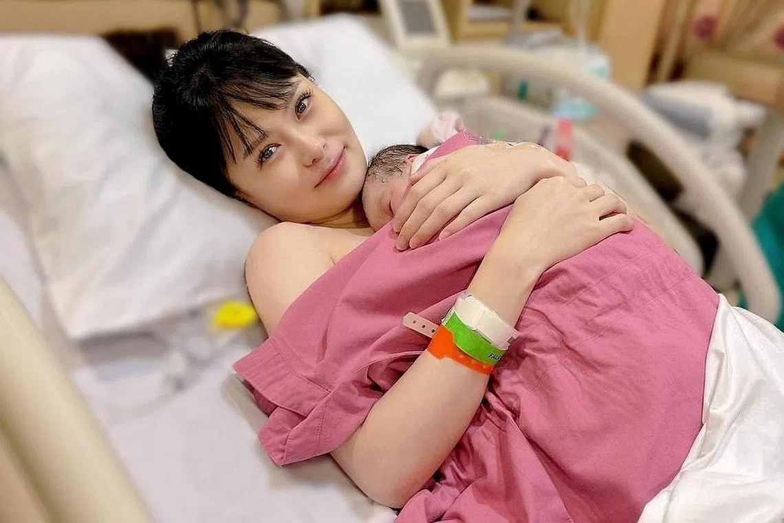 Jayley Woo with her newborn daughter Jan, who was born on Jan 20.