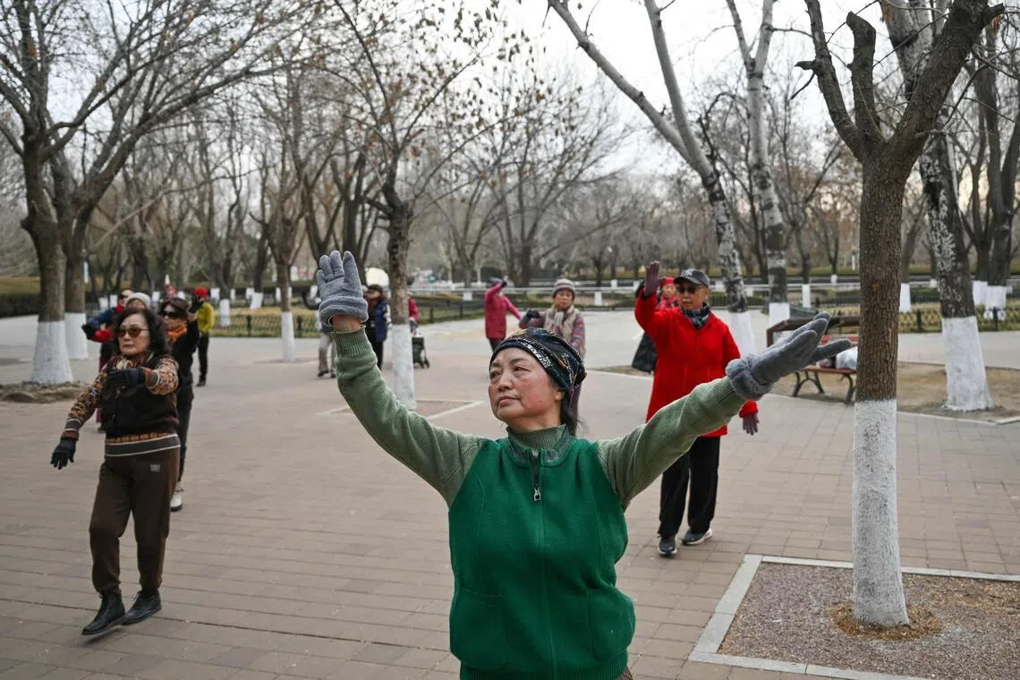 People dancing at Chaoyang Park in Beijing, China, on Feb 5. 