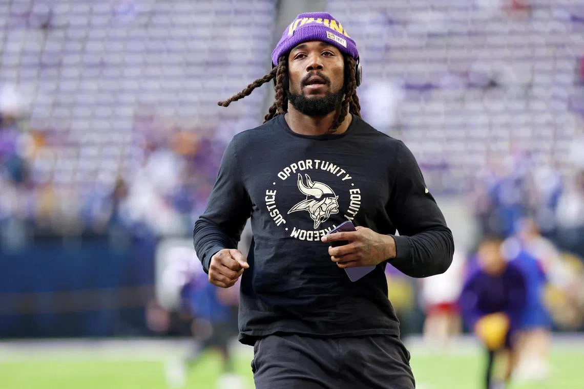 FILE PHOTO: Jan 15, 2023; Minneapolis, Minnesota, USA; Minnesota Vikings running back Dalvin Cook (4) during warmups before a wild card game against the New York Giants at U.S. Bank Stadium. Mandatory Credit: Matt Krohn-USA TODAY Sports/File Photo