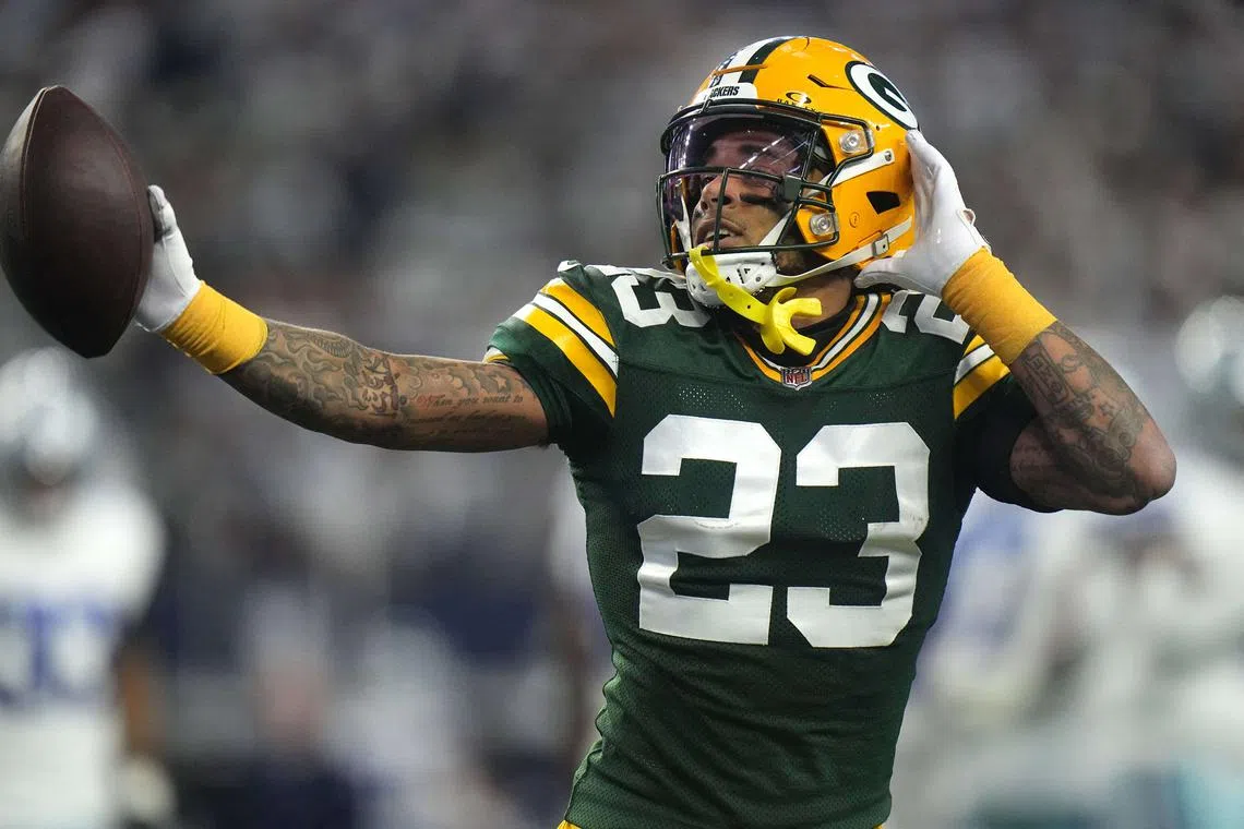 FILE PHOTO: Jan 14, 2024; Arlington, Texas, USA; Green Bay Packers cornerback Jaire Alexander (23) reacts after intercepting a pass during the first quarter of the wild card playoff game against the Dallas Cowboys Sunday, January 14, 2024 at AT&T Stadium in Arlington, Texas. Mandatory Credit: Mark Hoffman-USA TODAY Sports/File Photo