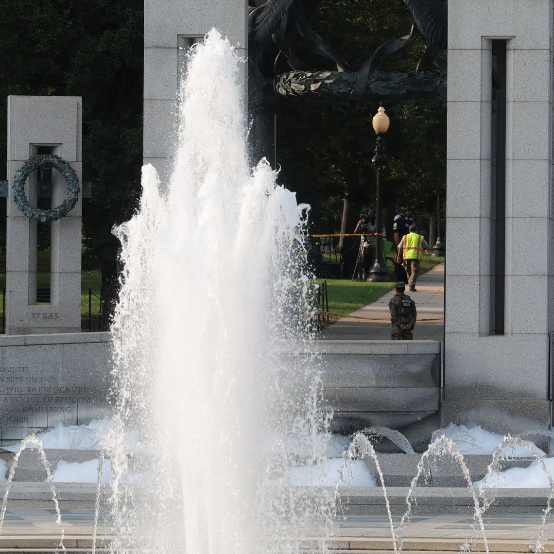 Soap at the pool of the National World War II Memorial after it was reportedly vandalized with soap and graffiti in Washington, D.C., U.S., August 13, 2026. REUTERS/Kylie Cooper