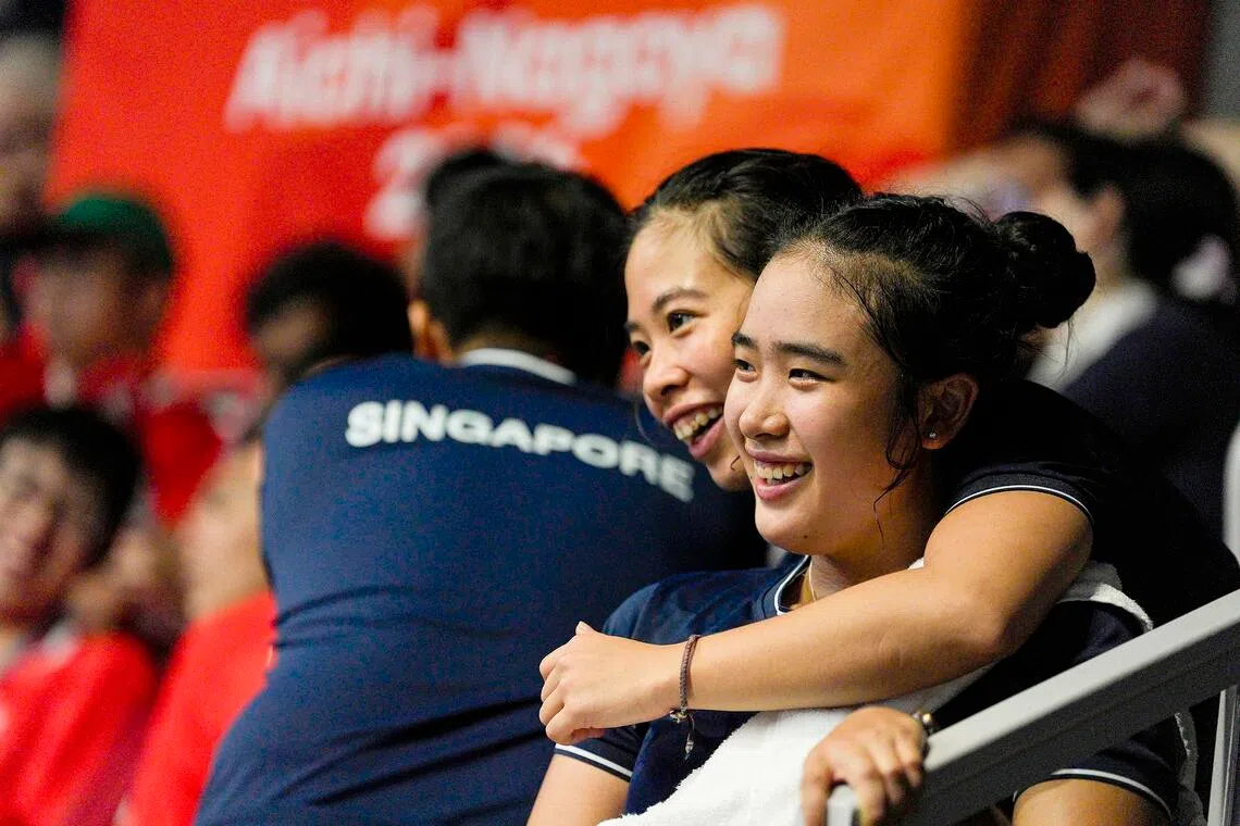 Singapore’s top women’s squash player Au Yeong Wai Yhann (left) has had to balance being protective and giving her younger sister and fellow national player Wai Iynn space to grow and learn.