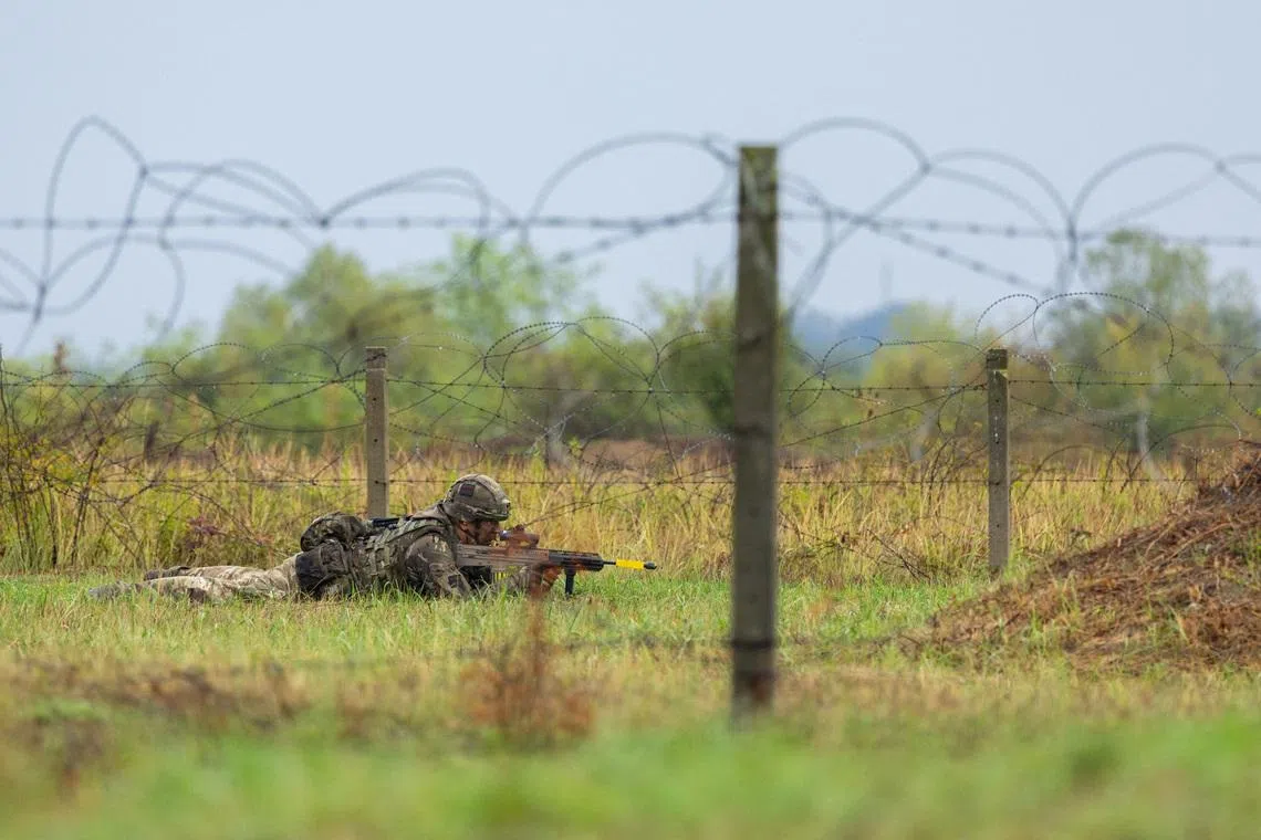 FILE PHOTO: A soldier takes part in the \"Sava Star 24\" joint military exercise of Britain and Croatia in Gasinci military base, Croatia, September 25, 2024. REUTERS/Antonio Bronic/File Photo