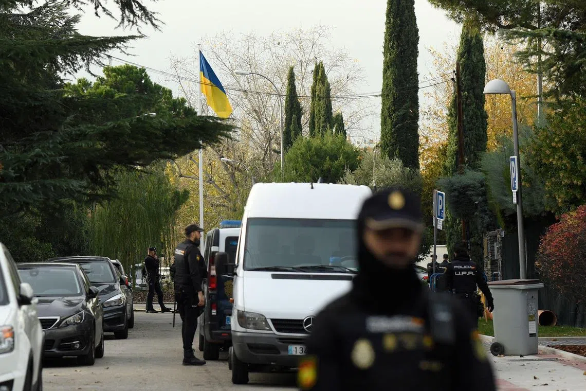 Spanish police secure the area after a letter bomb explosion at the Ukraine's embassy in Madrid.