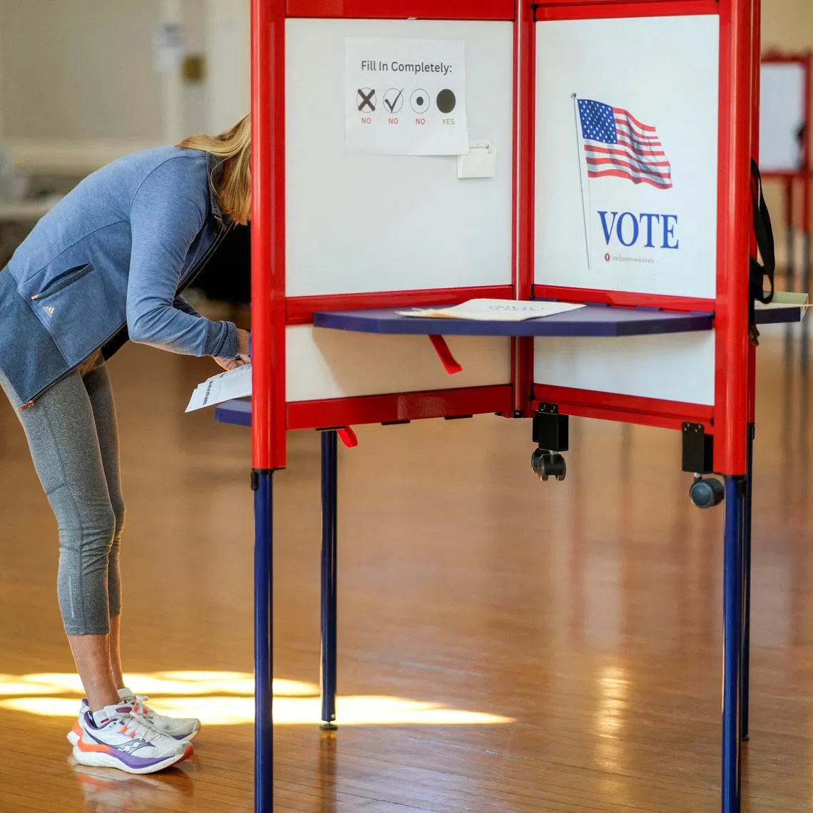 A person votes during the New Jersey primary elections for US Congress, in Glen Ridge, New Jersey, on June 2.