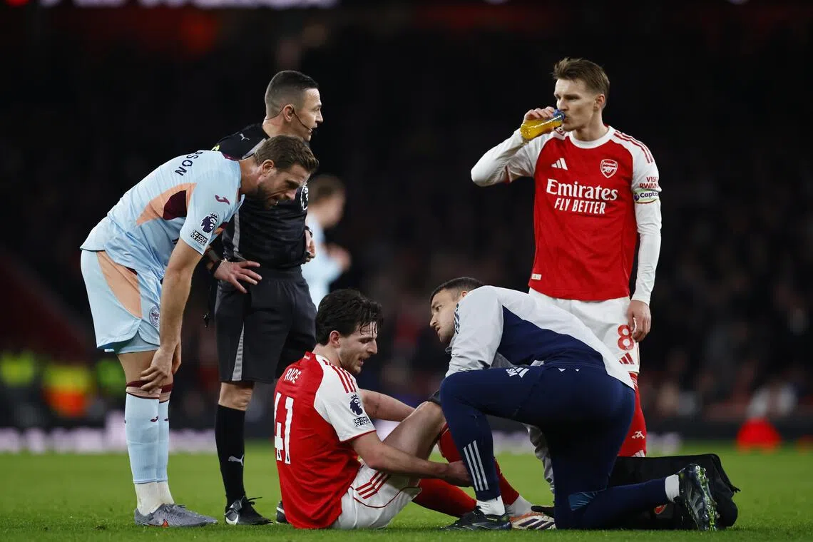 Arsenal's Declan Rice receiving treatment during the Premier League match against Brentford.