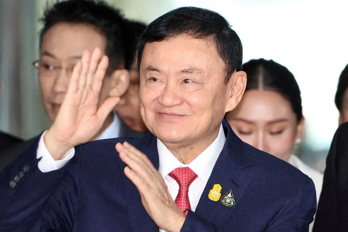 FILE PHOTO: Former Thai Prime Minister Thaksin Shinawatra walks at Don Mueang airport in Bangkok, Thailand August 22, 2023. REUTERS/Athit Perawongmetha/File Photo