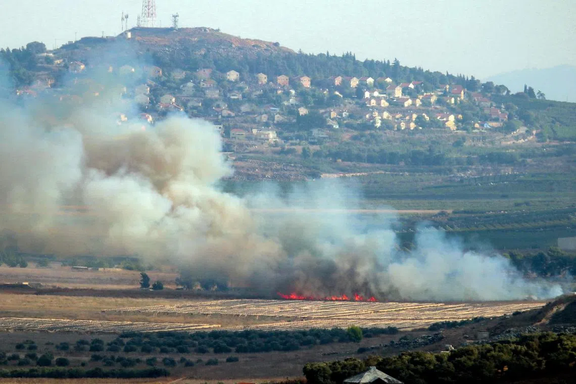 Smoke rising on the southern Lebanese Marjayoun plain, after being hit by Israeli shelling on Sept 7.