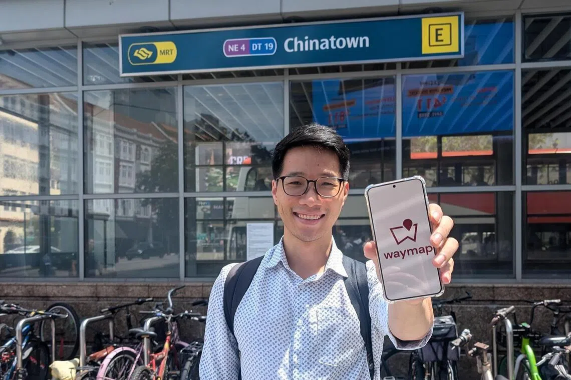 jowaymap - Mr Anselm De Mello, Waymap's head of Southeast Asia, demonstrating the app outside Chinatown MRT station.
Credit: Waymap