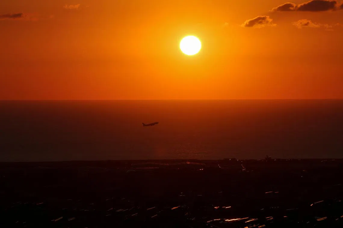FILE PHOTO: A plane departs Beirut-Rafic Hariri International Airport, as seen from Hadath, Lebanon September 25, 2024. REUTERS/Mohamed Azakir/File Photo
