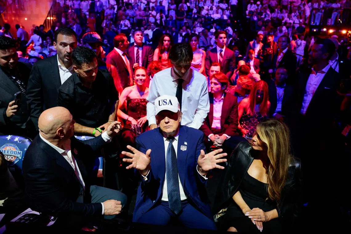 U.S. President Donald Trump gestures as he attends UFC Freedom 250 on the South Lawn of the White House in Washington, D.C., U.S., June 15, 2026. REUTERS/Evan Vucci