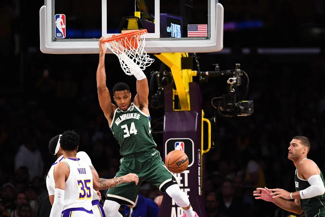 Milwaukee Bucks forward Giannis Antetokounmpo dunking  in the first quarter against the Los Angeles Lakers at Crypto.com Arena. 