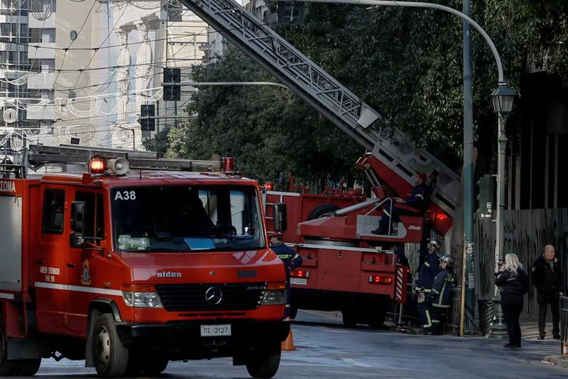 Firemen work at the area where an explosive device went off outside Greece's labour ministry in Athens, Greece, February 3, 2024. REUTERS/Louisa Gouliamaki