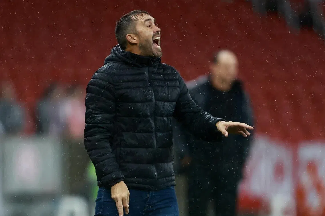Soccer Football - Brasileiro Championship - Internacional v Bahia - Estadio Beira-Rio, Porto Alegre, Brazil - April 13, 2024  Internacional coach Eduardo Coudet reacts REUTERS/Diego Vara