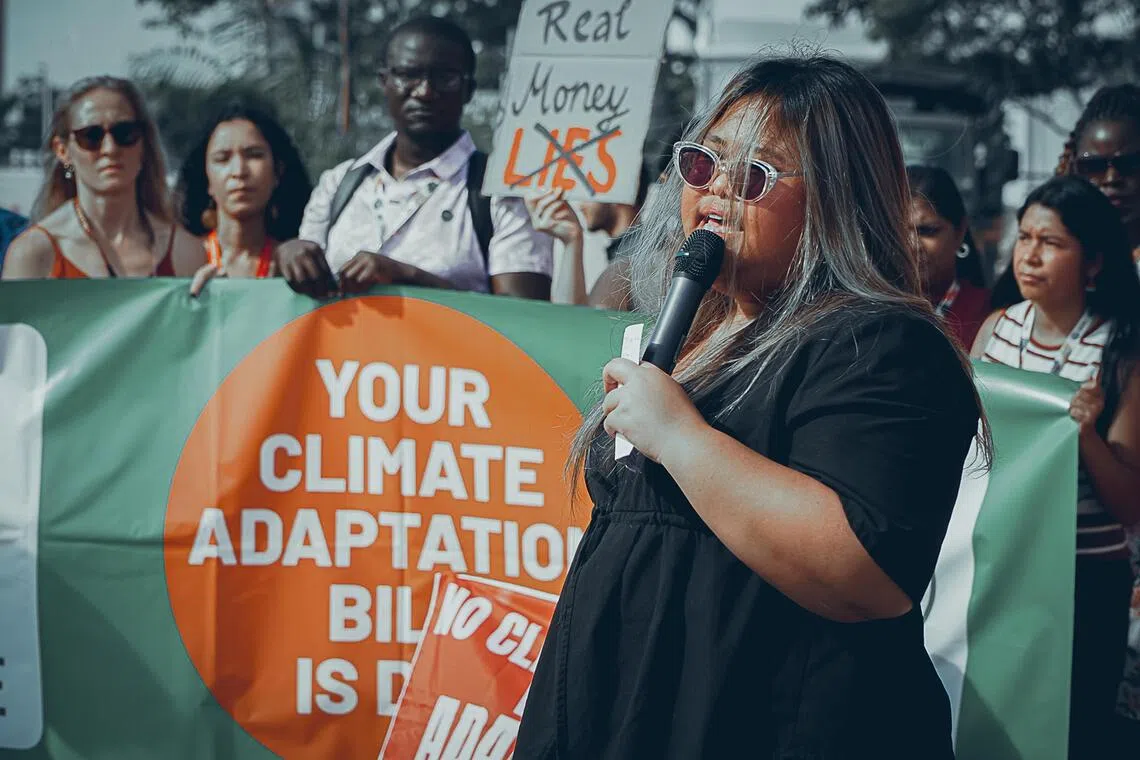aqadapt14 - Ms Ellenor Bartolome, 25, senior executive officer at the Philippine Movement for Climate Justice. She speaks about the typhoons that hit the Philippines last week.

Credit to: Jason Valenzuela of Asian Peoples' Movement on Debt and Development