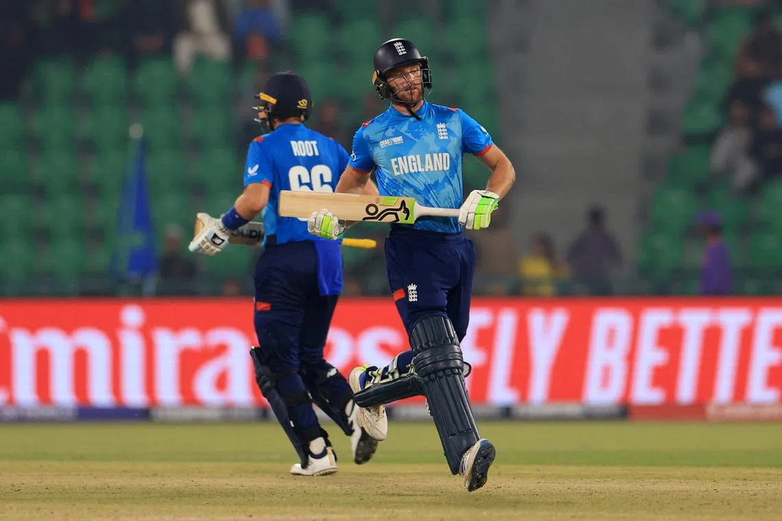 Cricket - ICC Men's Champions Trophy - Group B - England v Afghanistan - Gaddafi Stadium, Lahore, Pakistan - February 26, 2025 England's Jos Buttler and Joe Root in action REUTERS/Akhtar Soomro