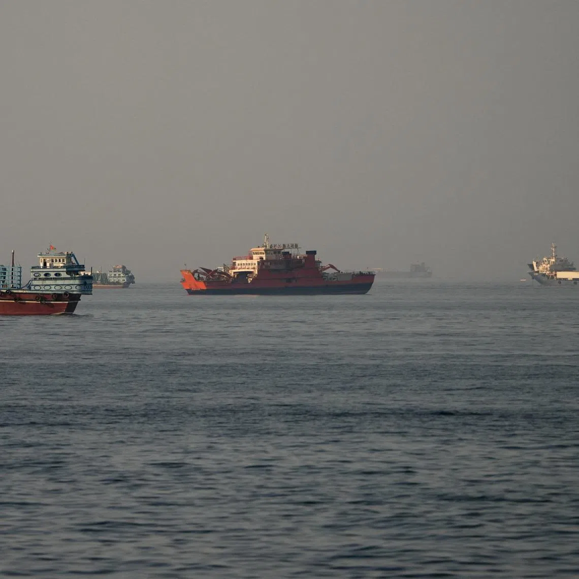 Vessels at the Strait of Hormuz, as seen from Musandam, Oman, June 14, 2026. REUTERS/Stringer