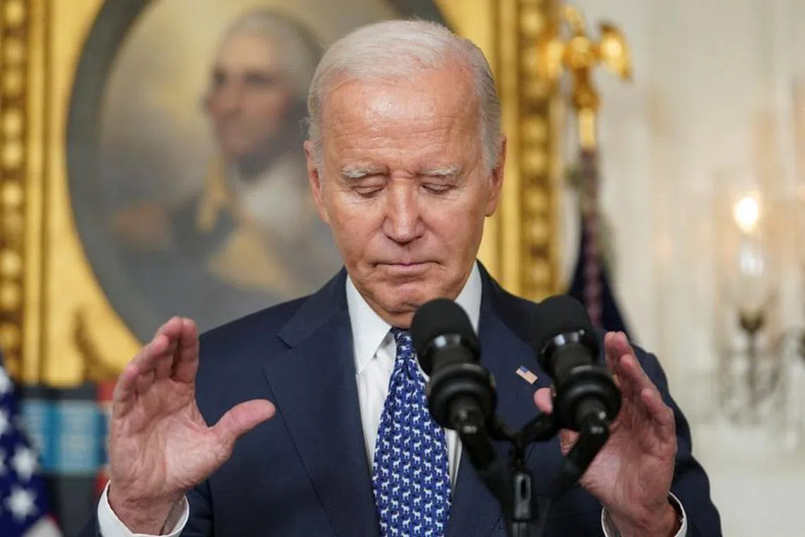 U.S. President Joe Biden gestures as he delivers remarks at the White House in Washington, U.S., February 8, 2024. REUTERS/Kevin Lamarque