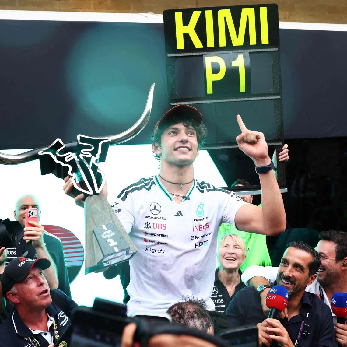 Winner Kimi Antonelli celebrates with the Mercedes team during the US Grand Prix at the Circuit of the Americas on Oct 25, in Austin, Texas.