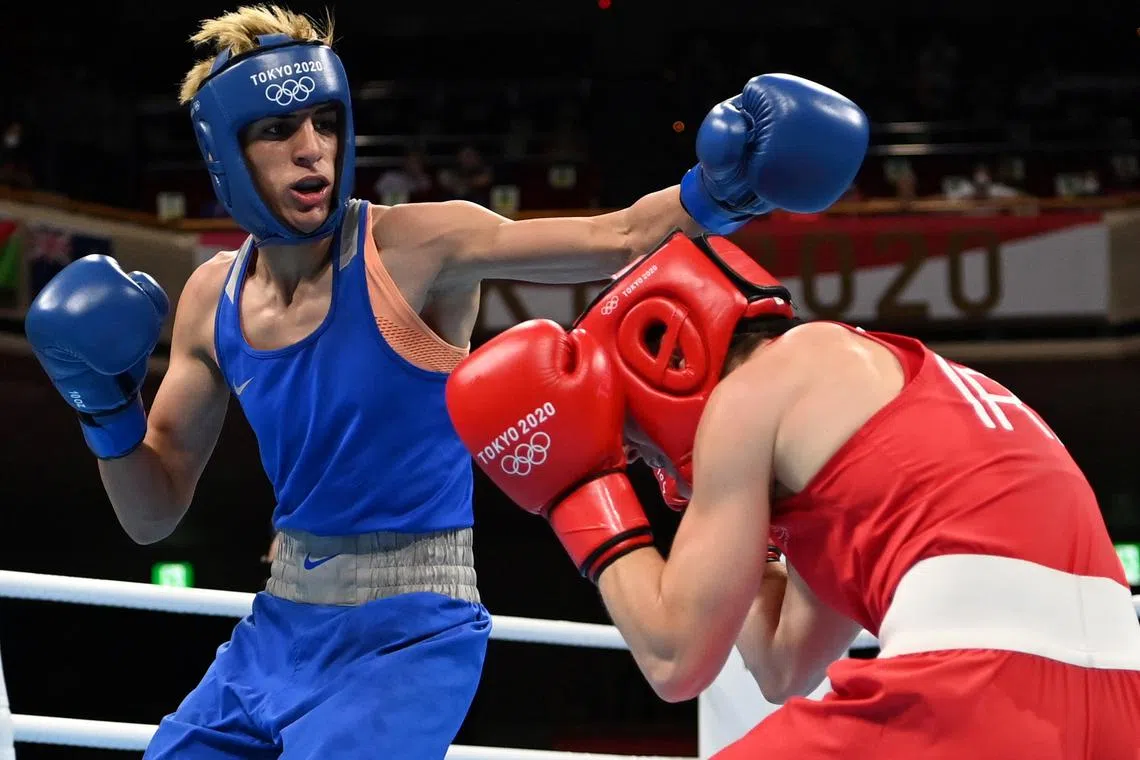 FILE PHOTO: Tokyo 2020 Olympics -  Boxing - Women's Lightweight - Quarterfinal - Kokugikan Arena - Tokyo, Japan - August 3, 2021  Kellie Harrington of Ireland in action against Imane Khelif of Algeria Pool via REUTERS/Luis Robayo/File Photo