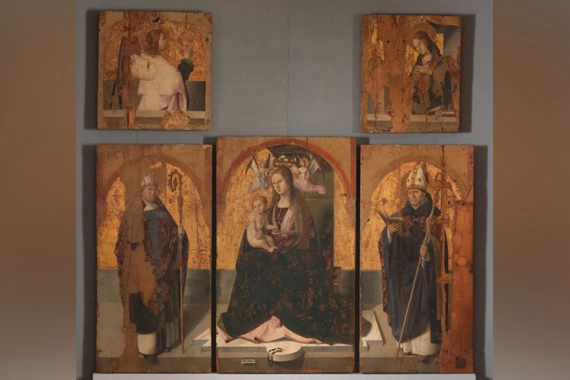 The thieves took three of five remaining panels (above) that made up an altarpiece known as Polittico di San Gregorio.