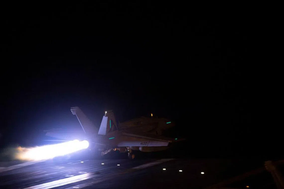 An aircraft takes off to join the U.S.-led coalition to conduct air strikes against military targets in Yemen, aimed at the Iran-backed Houthi militia that has been targeting international shipping in the Red Sea, from an undisclosed location, in this handout picture released on January 12, 2024. US Central Command via X/Handout via REUTERS