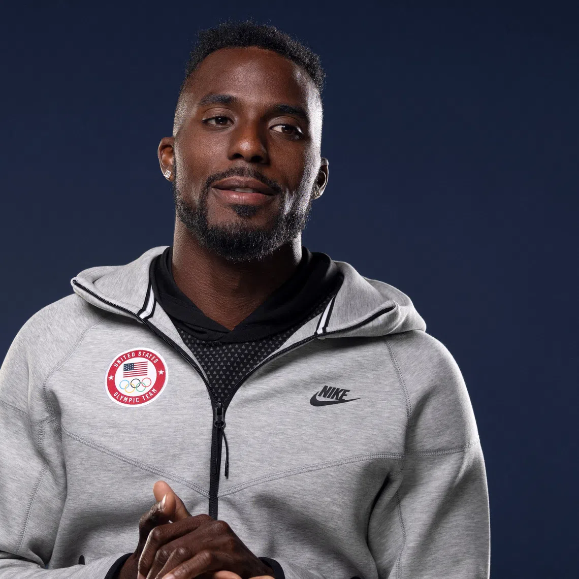 American track and field sprinter Kenny Bednarek poses for a portrait during the Team USA media summit ahead of the Paris Olympics and Paralympics, at an event in New York, U.S., April 16, 2024. REUTERS/Andrew Kelly
