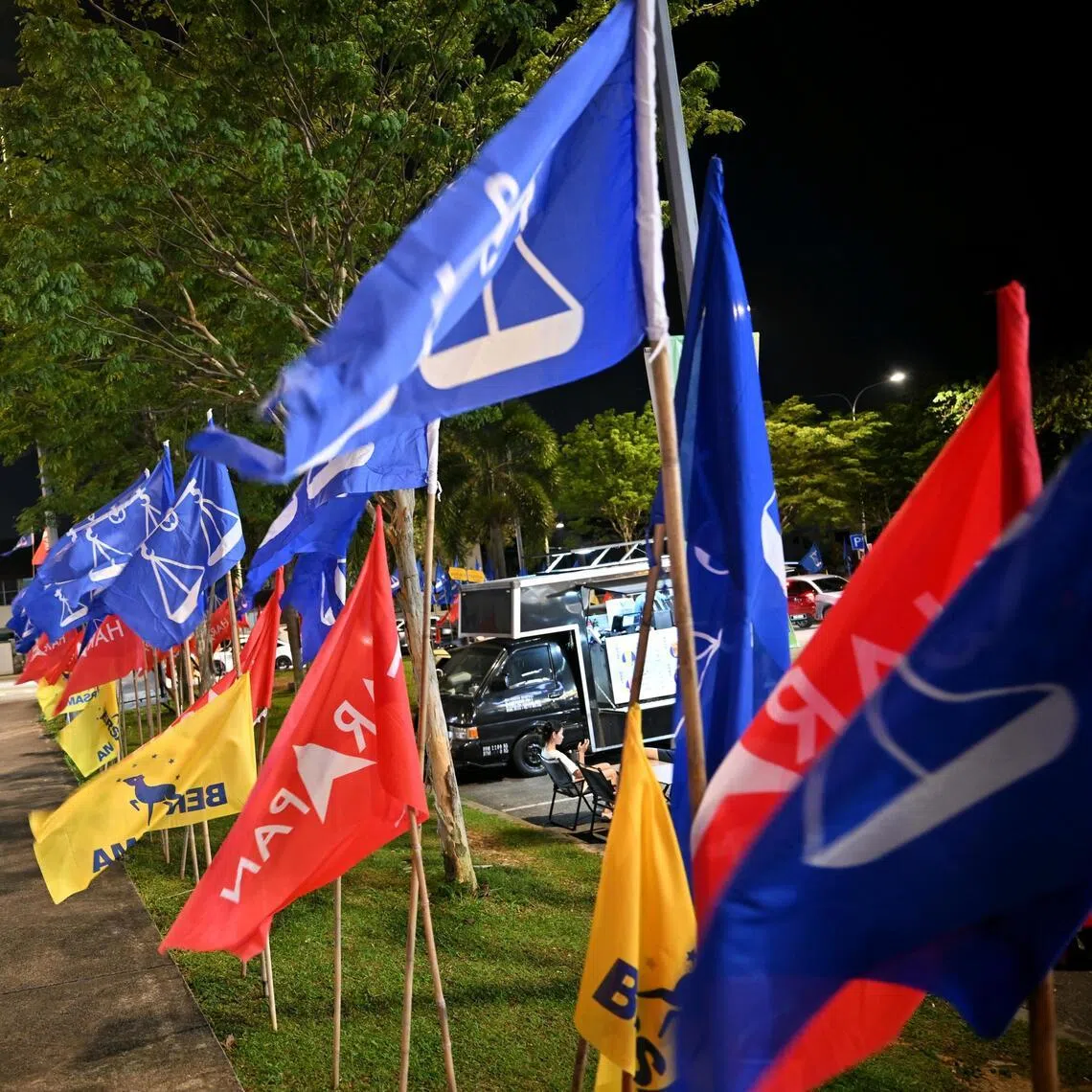 Flags of Barisan Nasional, Pakatan Harapan and Parti Bersama Malaysia seen in Stulang during Johor campaigning.