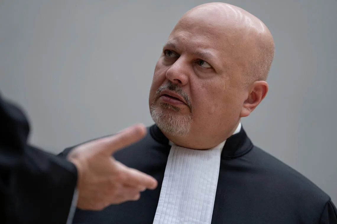 Chief Prosecutor Karim Khan talks while waiting for former Philippine President Rodrigo Duterte to appear via video link before the International Criminal Court (ICC), in The Hague, Netherlands, Friday, March 14, 2025.     Peter Dejong/Pool via REUTERS