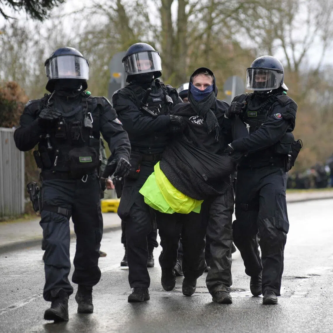 Some protesters were arrested by police after trying to block access to the AfD meeting on Nov 29.