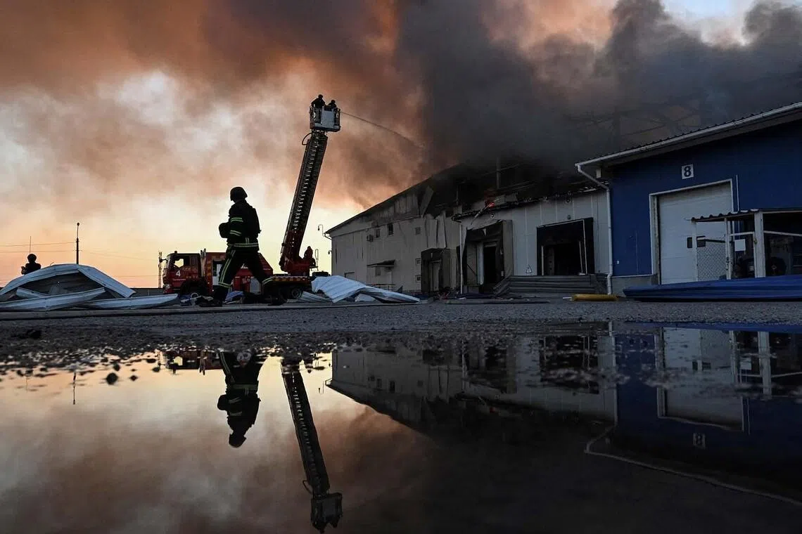 Rescuers work at the site of a Russian missile strike, amid Russia's attack on Ukraine, in Zaporizhzhia, Ukraine July 1, 2026. REUTERS/Stringer TPX IMAGES OF THE DAY