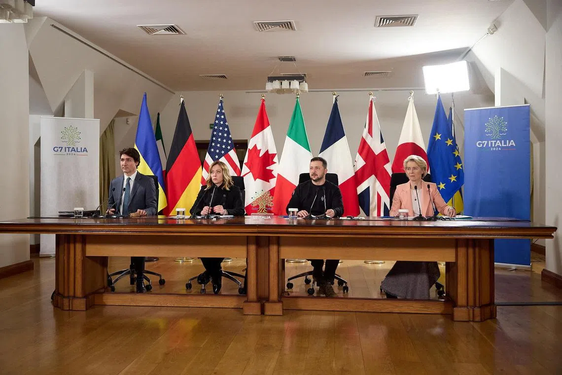 Attending a video conference with G-7 leaders are (from left) Canadian Prime Minister Justin Trudeau, Italian Prime Minister Giorgia Meloni, Ukrainian President Volodymyr Zelensky and European Commission president Ursula von der Leyen.